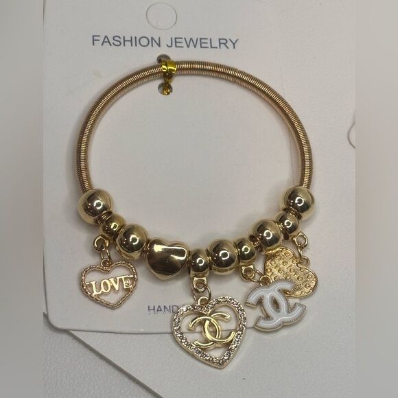 Fashion Jewelry Gold Tone Sparkling Heart
Charm Black charm Stretch Bracelet - Picture 3 of 5